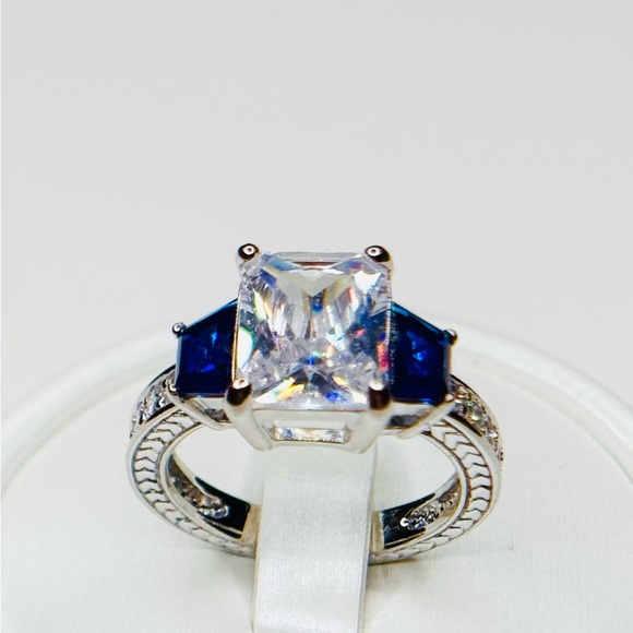 Jewelry - Elegant Sterling Silver Emerald Cut White Stone w/Blue Sapphire Stones